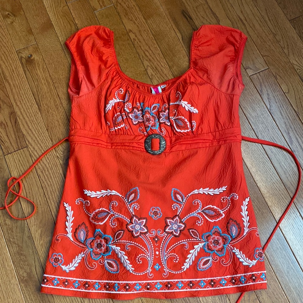 Women’s large embroidered top.